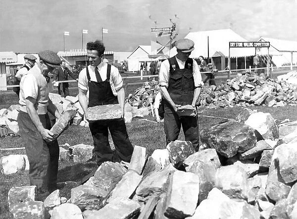It might look like just a pile of rubble but in fact these three men were displaying