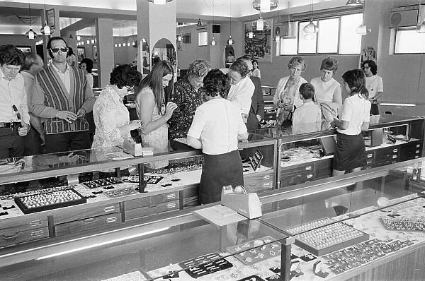 Looking for bargains, souvenir shopping, Majorca, Spain, August 1971