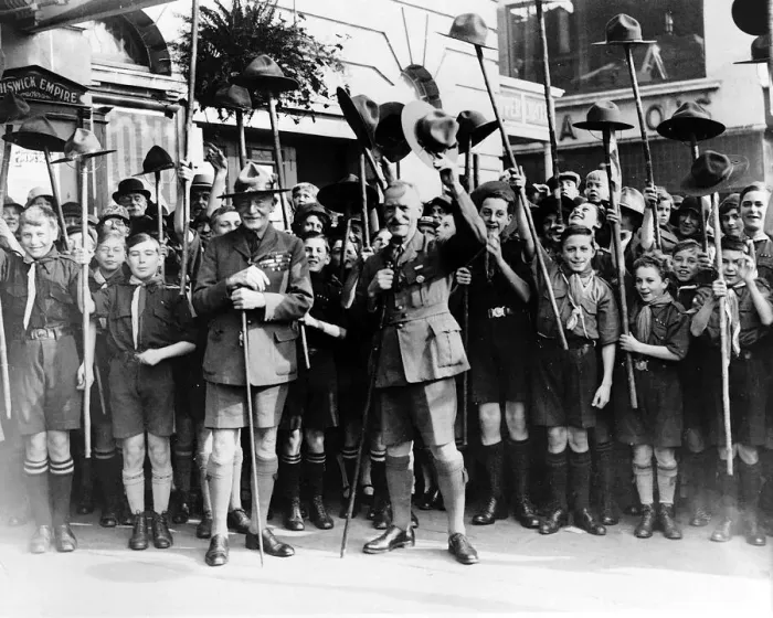 Framed Print : Lord Baden-Powell founder of the Boy Scouts Cubs with group of boys waving hats in Framed Print : Lord Baden-Powell founder of the Boy Scouts Cubs with group of boys waving hats in