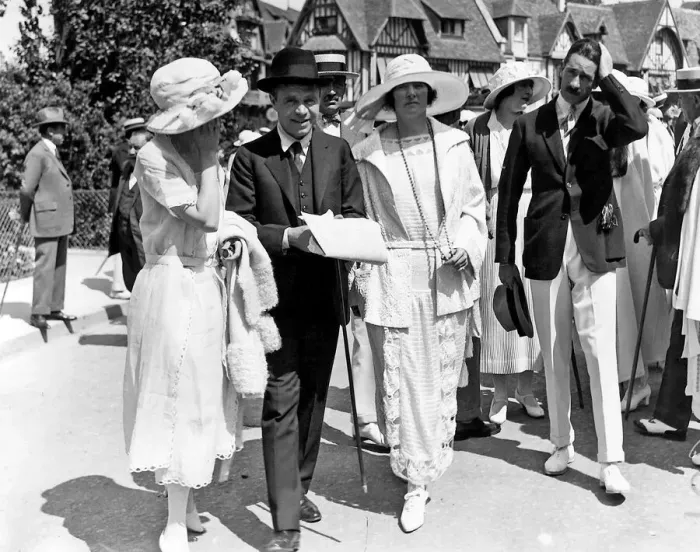 Framed Print : Lord Beaverbrook with Lady Beaverbrook attend the horseracing at Deauville on their Framed Print : Lord Beaverbrook with Lady Beaverbrook attend the horseracing at Deauville on their