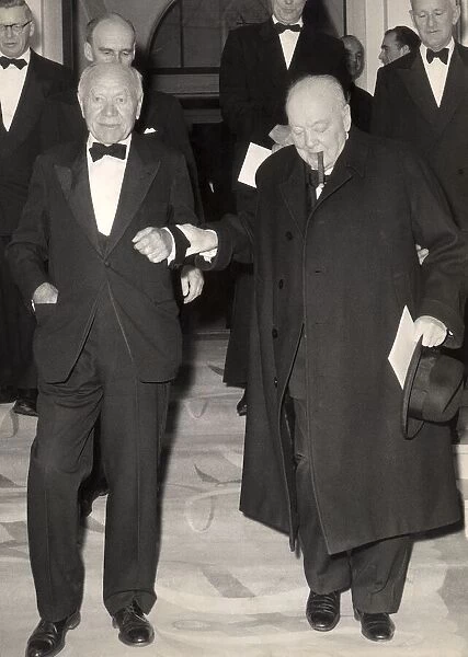 Lord Beaverbrook and Sir Winston Churchill leave a black tie event, 29th May 1958