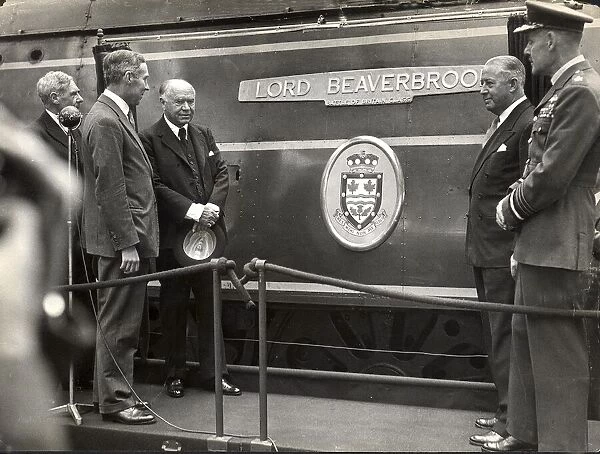 Lord Beaverbrook unveils his nameplate on a Southern Railway train, BR 34054  /  SR No