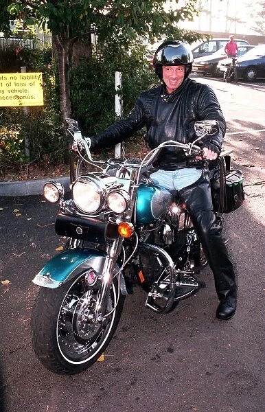 Lord Brocket a polo-playing pal of Prince Charles riding his 1300cc Harley Davidson bike