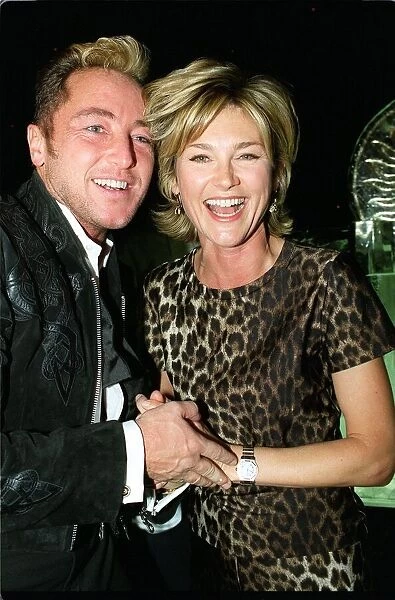 LORD OF THE DANCE MICHAEL FLATLEY CELEBRATING WITH ANTHEA TURNER AT HIS AFTER SHOW PARTY