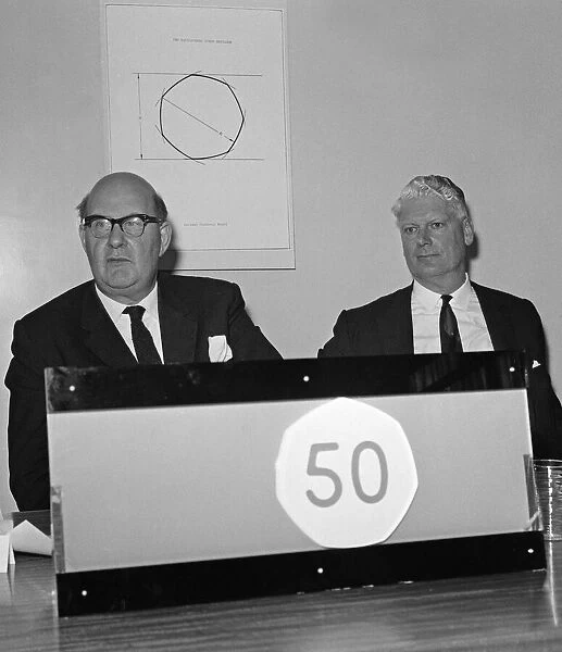 Lord Fiske (left) and Sir Hugh Conway at the unveiling of the new fifty pence piece at a
