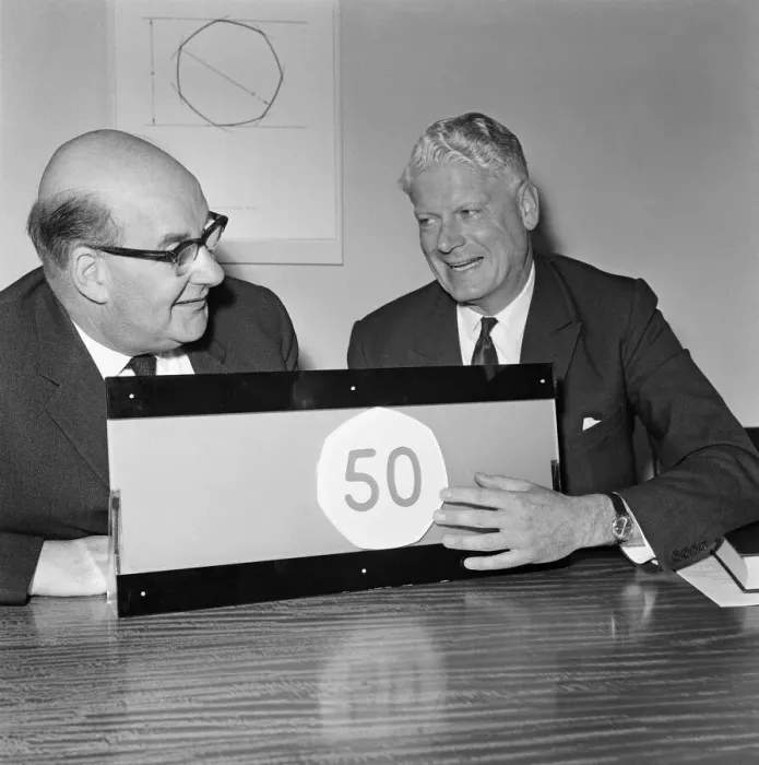 Framed Print : Lord Fiske (left) and Sir Hugh Conway at the unveiling of the new fifty pence piece at a Framed Print : Lord Fiske (left) and Sir Hugh Conway at the unveiling of the new fifty pence piece at a