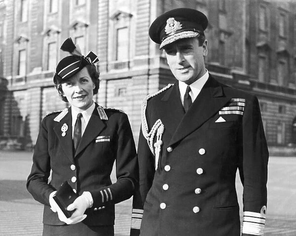 Lord Louis Mountbatten with his wife Edwina at Buckingham Palace for an investiture