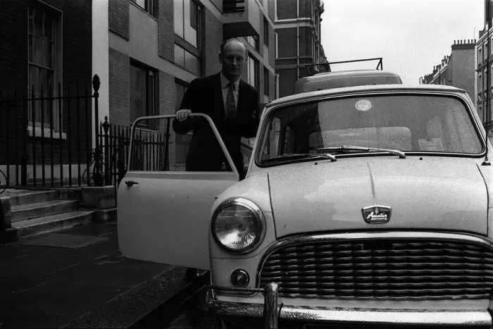 Framed Print : Lord Montagu April 1963 getting into his mini after lunch with Duke of Bedford in Framed Print : Lord Montagu April 1963 getting into his mini after lunch with Duke of Bedford in