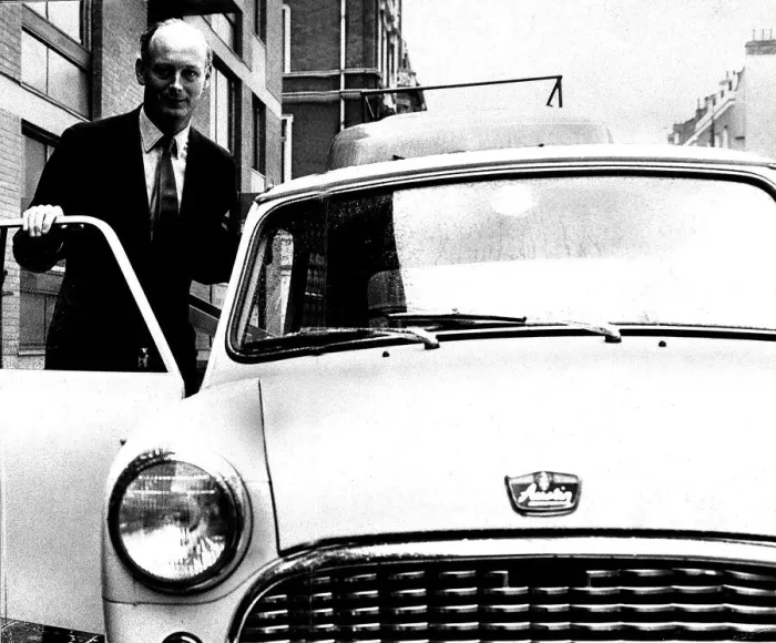 Framed Print : Lord Montagu of Beaulieu April 1963. Poses next to his Mini motor car Framed Print : Lord Montagu of Beaulieu April 1963. Poses next to his Mini motor car