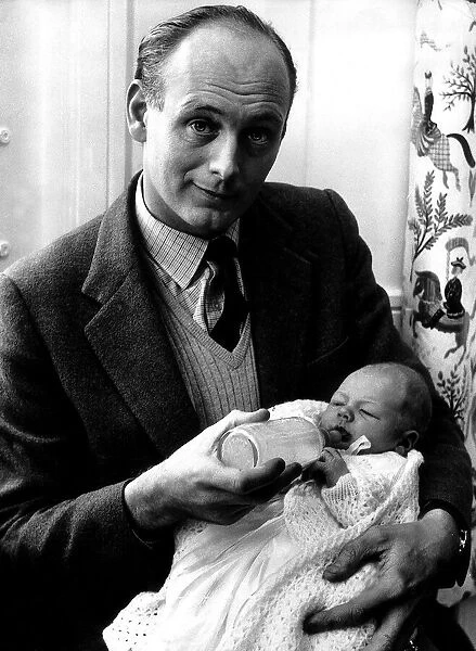 Lord Montagu of Beaulieu with his newborn son 1961 Ralph Montagu giving him his first