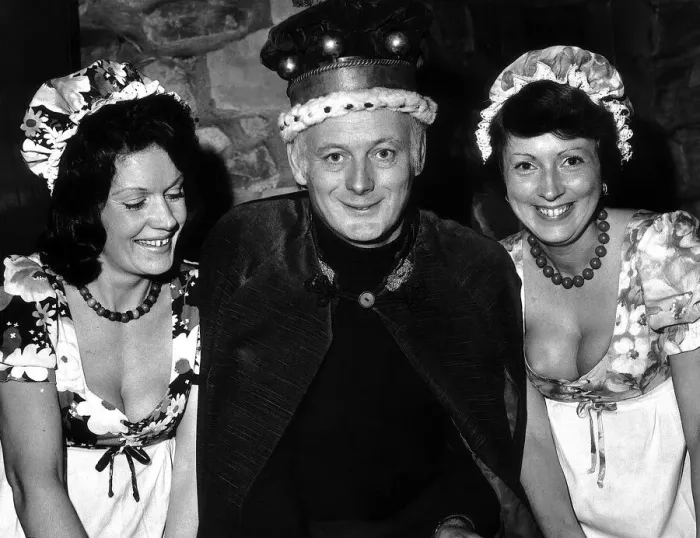 Framed Print : Lord Montagu of Beaulieu November 1975 assisted by 2 wenches Sue Dew Framed Print : Lord Montagu of Beaulieu November 1975 assisted by 2 wenches Sue Dew