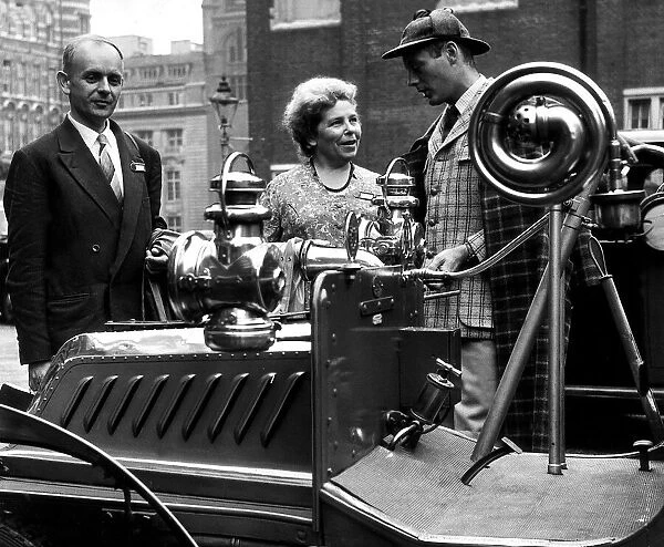 Lord Montagu of Beaulieu will play the horns July 1958 on his 1903 De Dion Bouton car at