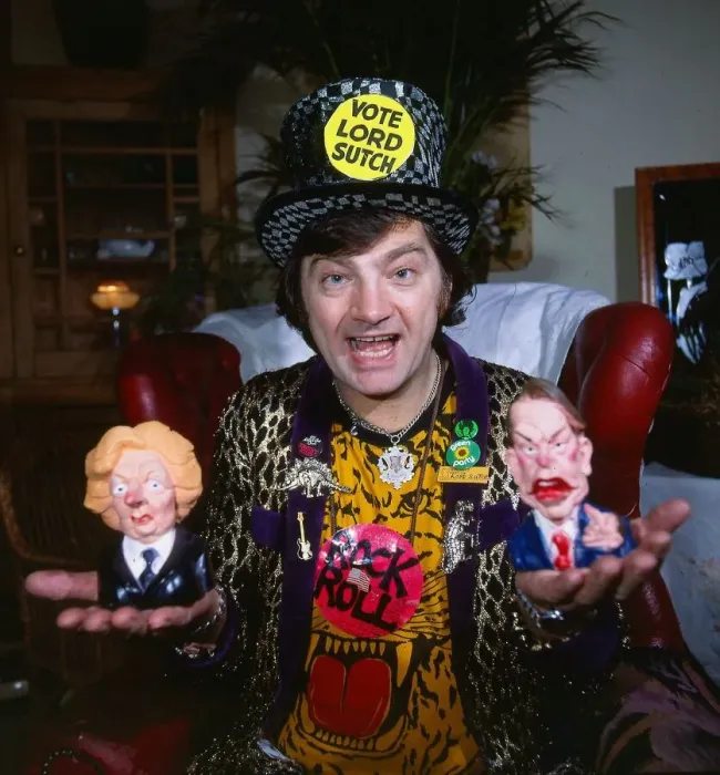 Framed Print : Lord Sutch May 1989 holding Margaret Thatcher and Ronald Reagan dog chews