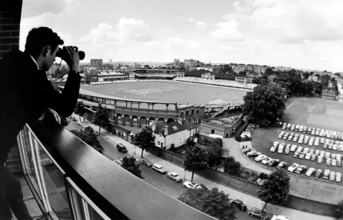 Framed Print : Lords View. Johnathan Cree watching the first day of cricket from the balcony of his Framed Print : Lords View. Johnathan Cree watching the first day of cricket from the balcony of his