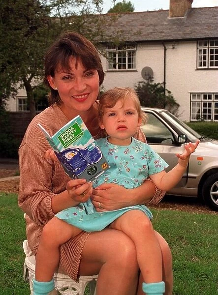 Lorraine Kelly the television presenter with her daughter holding a road safety leaflet