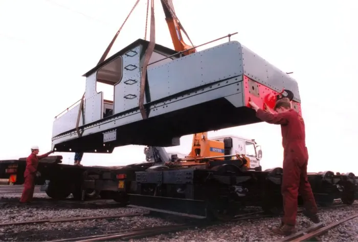 Framed Print : A lottery grant facelift begins for the 1909 Siemens locomotive as its is lifted on to a Framed Print : A lottery grant facelift begins for the 1909 Siemens locomotive as its is lifted on to a