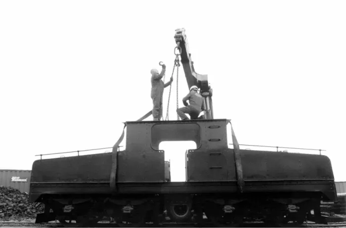 Framed Print : A lottery grant facelift begins for the 1909 Siemens locomotive as its is lifted on to a