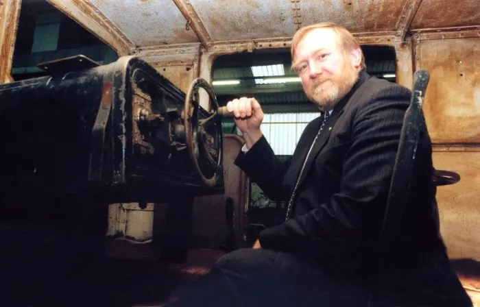 Framed Print : Lou Avis of Siemens Electronics takes a look at the 1909 Siemens engine being restored Framed Print : Lou Avis of Siemens Electronics takes a look at the 1909 Siemens engine being restored