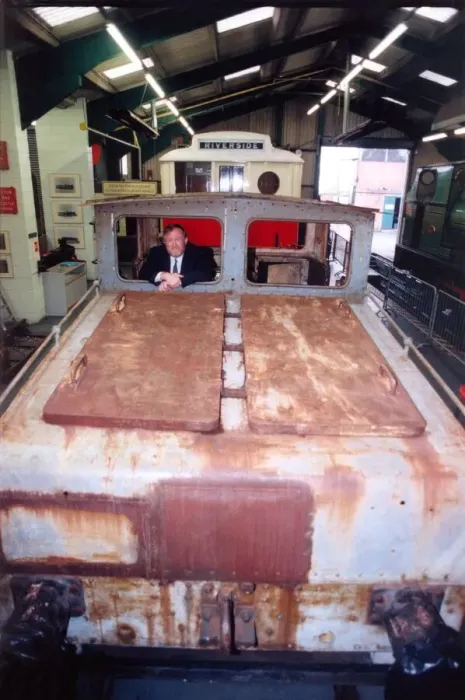 Framed Print : Lou Avis of Siemens Electronics takes a look at the 1909 Siemens engine being restored