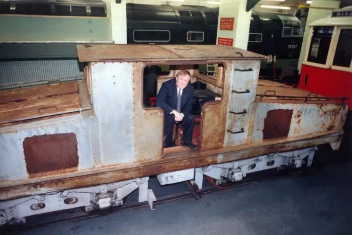 Framed Print : Lou Avis of Siemens Electronics takes a look at the 1909 Siemens engine being restored