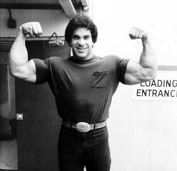 Lou Ferrigno Actor and Bodybuilder with arms up showing muscles March 1980