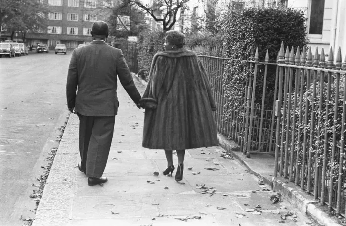 Framed Print : Louis Armstrong seen here arriving for a press conference at the Mayfair Hotel