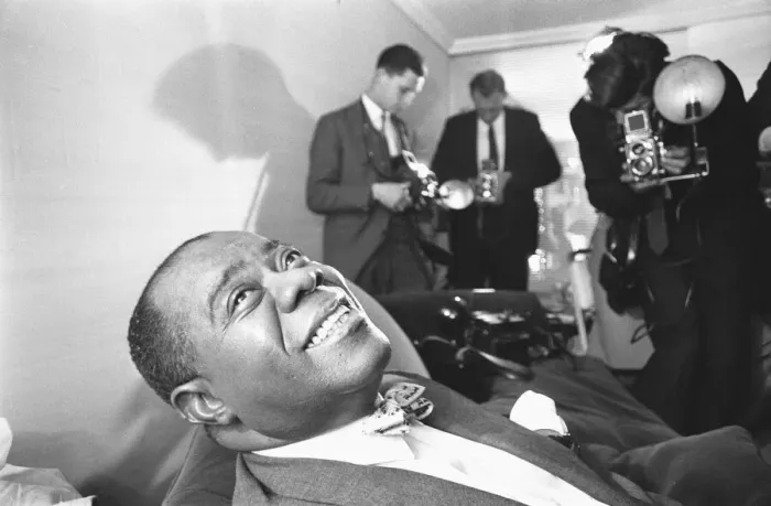 Framed Print : Louis Armstrong seen here giving a press conference at the Mayfair Hotel Framed Print : Louis Armstrong seen here giving a press conference at the Mayfair Hotel