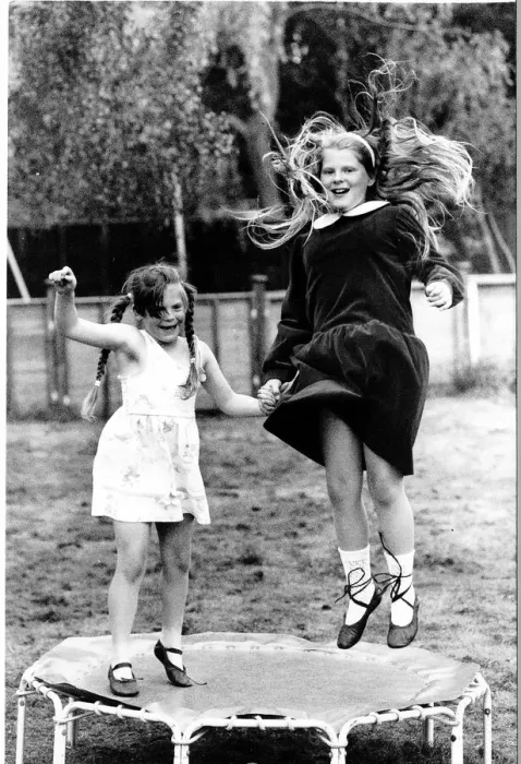 Framed Print : Louise Brown the worlds first test tube baby plays on a foot trampoline with her sister