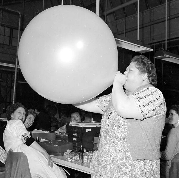 Louise German carries out quality control on Ariel Christmas Balloons Neg No D7130