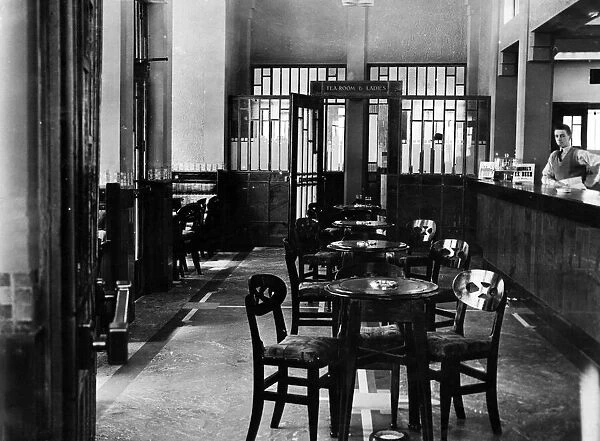The lounge the Heath Hotel pub in Allerton, Liverpool, complete with spittoons. 1931