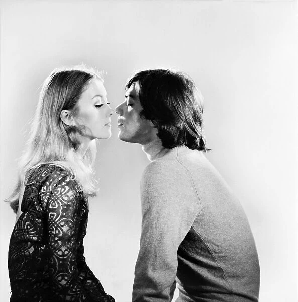 Love and Romance: A couple hugging and kissing. December 1969 Z12333-004