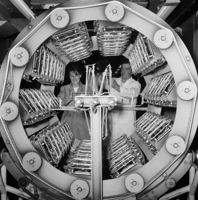 Framed Print : Lucas factory. Operators in the illuminating department where head lamp reflectors are
