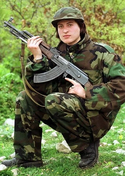 Luljeta Gashi of the Kosovo Liberation Army KLA April 1999 Female sodier crouching