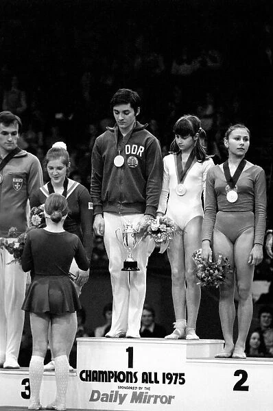 Lutz Mack with Nadia Comaneci with their trophies after winning the '