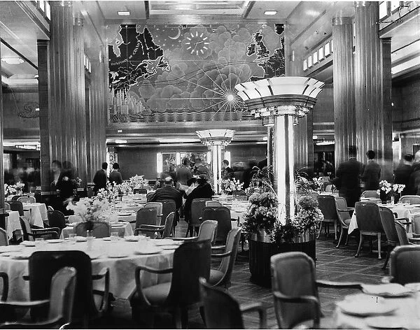 One of the more luxurious dining rooms aboard the Cunard liner Queen Mary