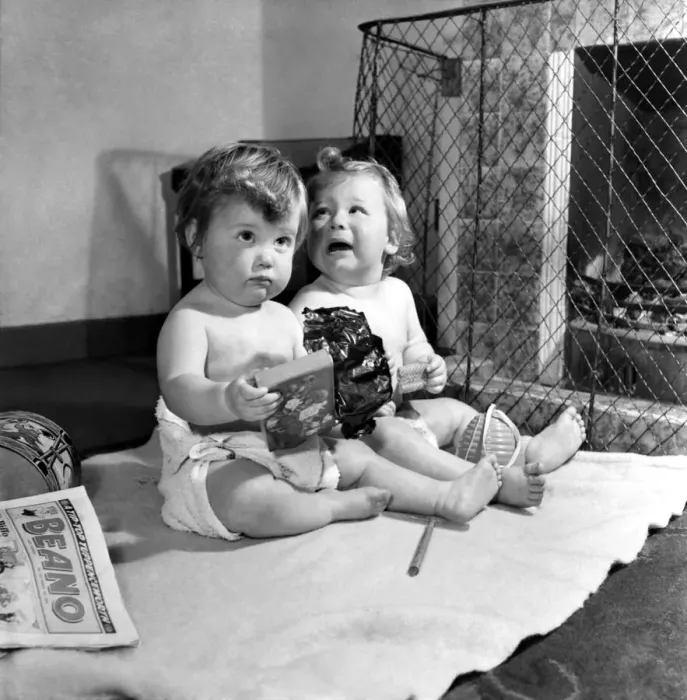 Framed Print : Lyn and Ian Graves disappointed with their present. November 1953 D6988 Framed Print : Lyn and Ian Graves disappointed with their present. November 1953 D6988