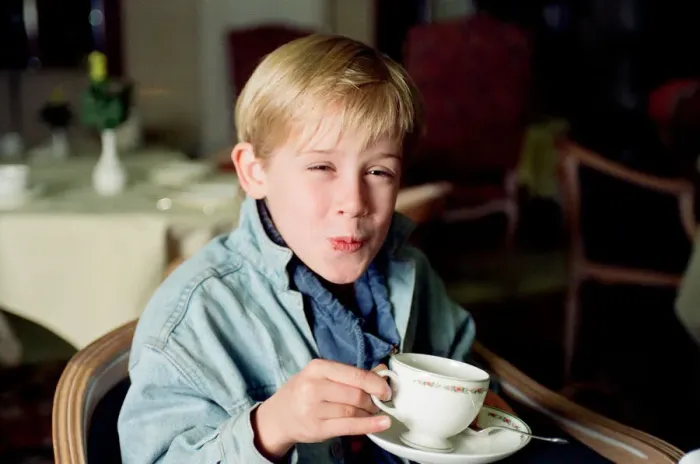 Framed Print : Macaulay Culkin sips his tea as he toasts his membership of he million-dollar-a movie
