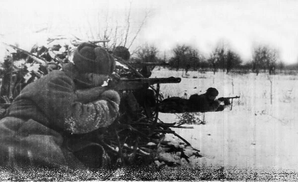 Machine gunners of the Soviet Red Army driving off a German counter attack