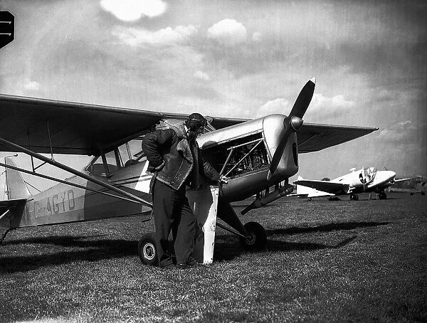 Mad Major Christopher Draper with his Auster aircraft. May 1950