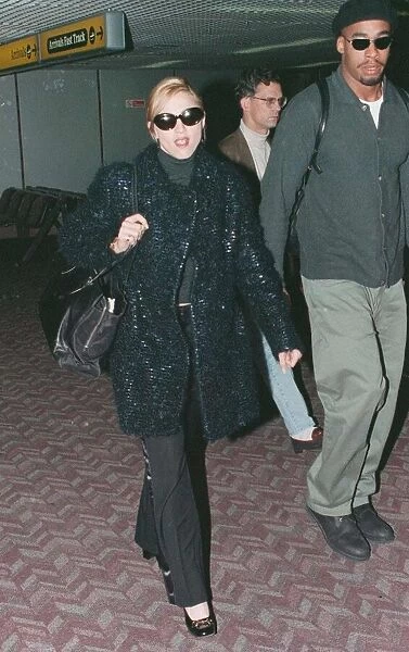 Madonna singer and actress arrives at Heathrow Airport in London