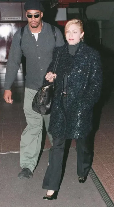 Framed Print : Madonna singer and actress arrives at Heathrow Airport in London