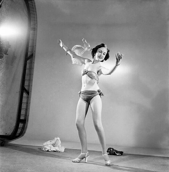 Magician Annette Clarke aged 17 Seen here plucking a bikini from thin air