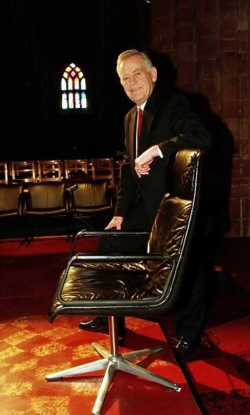 Magnus Magnusson television presenter seen here with the Mastermind chair in St Magnus