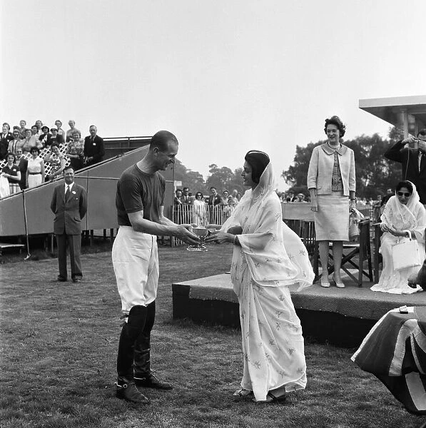 The Maharani of Jaipur presents Prince Philip, Duke of Edinburgh with the Victoria Cup