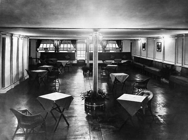 The main lounge of the R101 airship The colour scheme was white panels with gold inlay