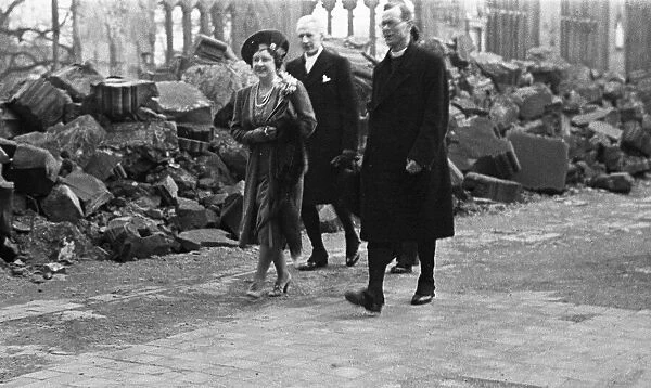 His Majesty King George VI and Queen Elizabeth inspect the damage to the cathedral in
