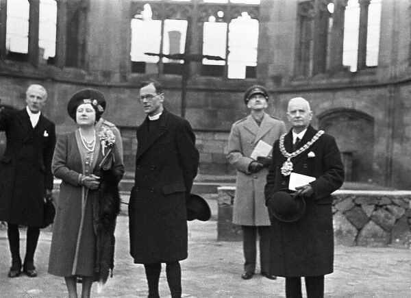 His Majesty King George VI and Queen Elizabeth inspect the damage to the cathedral in