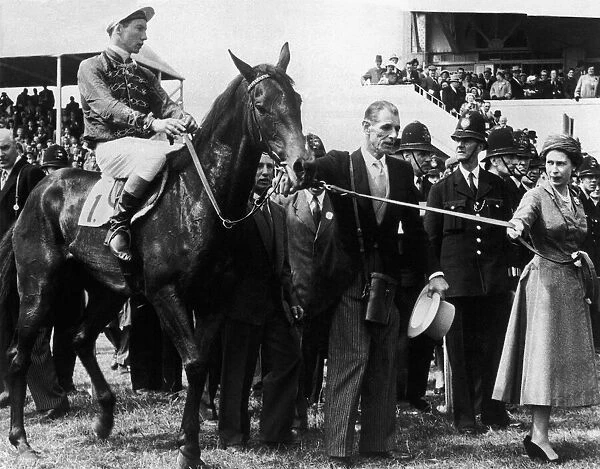 Her Majesty Queen Elizabeth II leading in her horse 'Carrogan'