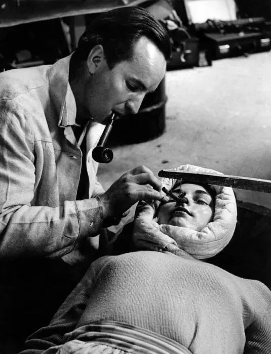 Framed Print : Make up artist John Lee who specialises in creating facial masks is seen here carefully Framed Print : Make up artist John Lee who specialises in creating facial masks is seen here carefully