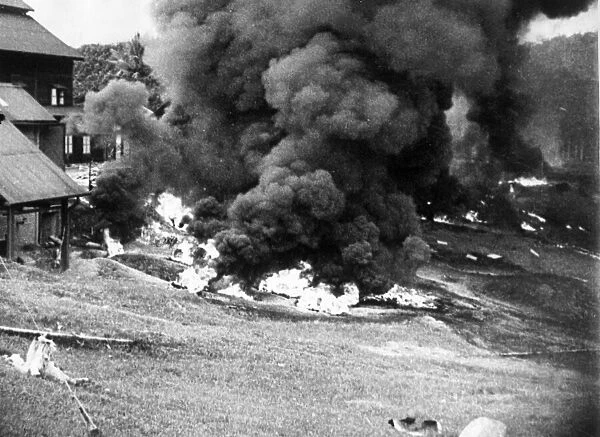 Malaya-Britain pursues scorched earth policy. British forces burn thousands of